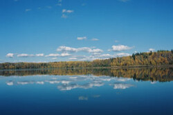 Mayatan lake and its shoreline on a sunny summer day.
