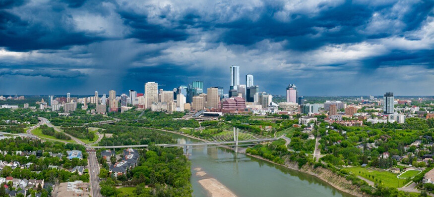 View of Edmonton's downtown and river valley in the summer.